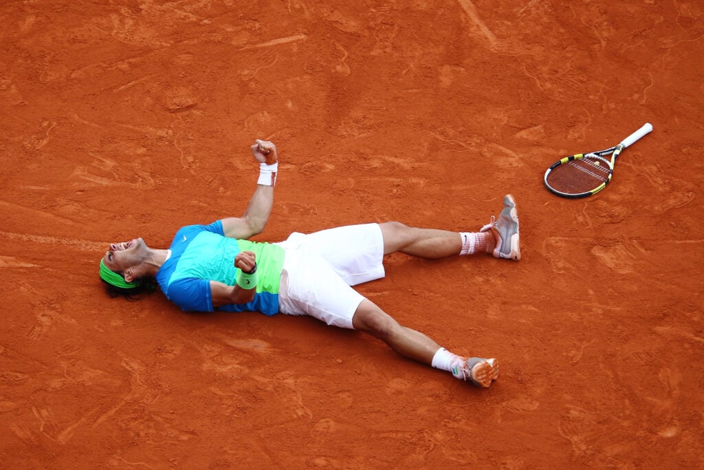 Rafael Nadal of Spain celebrates winning championship point during the men's singles final match between Rafael Nadal of Spain and Robin Soderling of Sweden on day fifteen of the French Open at Roland Garros on June 6, 2010 in Paris, France.