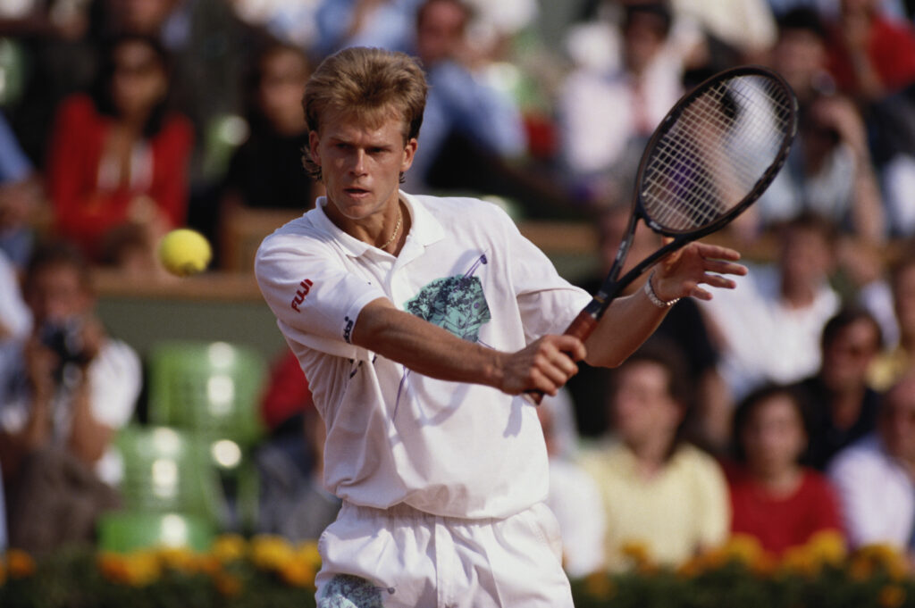 Stefan Edberg of Sweden makes a backhand volley return against Sergi Bruguera during their Men's Singles match during the French Open Tennis Championship on 28th May 1990 at the Stade Roland Garros Stadium in Paris, France.