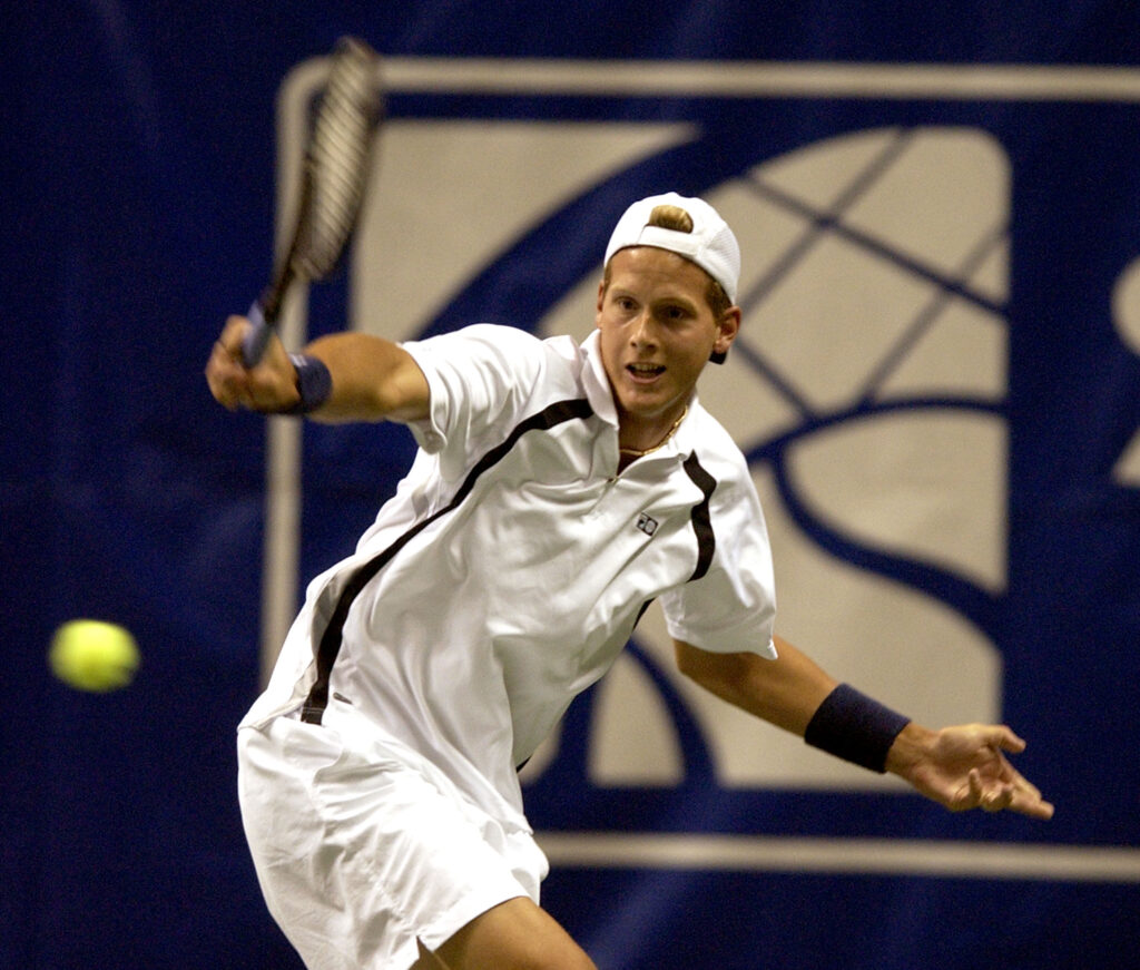Joachim Johansson of Sweden hits a return shot during his Qtr. Final match with Andy Roddick at the 2004 Siebel Open in San Jose, California, February 13, 2004. Roddick won the match 6-3, 7-6.