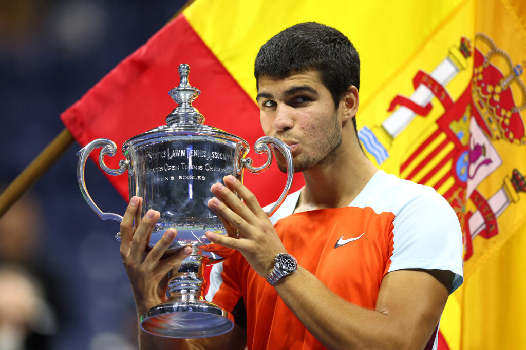 Carlos Alcaraz of Spain celebrates with the championship trophy after defeating Casper Ruud of Norway during their Men’s Singles Final match on Day Fourteen of the 2022 US Open at USTA Billie Jean King National Tennis Center on September 11, 2022 in the Flushing neighborhood of the Queens borough of New York City.