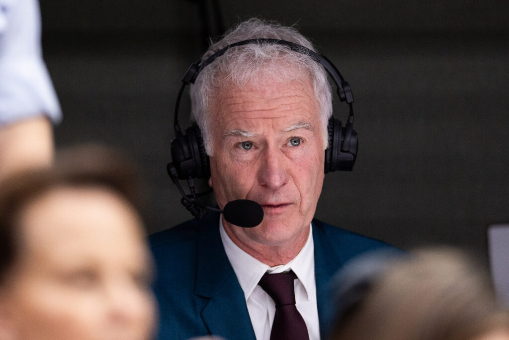 John McEnroe commentating during the Men's Singles Semifinal between Jannik Sinner of Italy and Novak Djokovic of Serbia at The Wimbledon Lawn Tennis Championship at the All England Lawn and Tennis Club at Wimbledon on July 14th, 2023 in London, England.