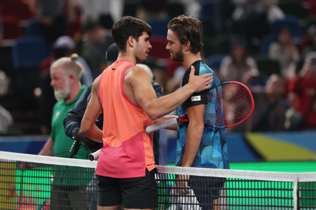 Carlos Alcaraz of Spain and Tomas Machac of the Czech Republic shake hands at the net after the Men's singles quarterfinals match on Day 11 of 2024 Shanghai Rolex Masters at Qi Zhong Tennis Centre on October 10, 2024 in Shanghai, China.