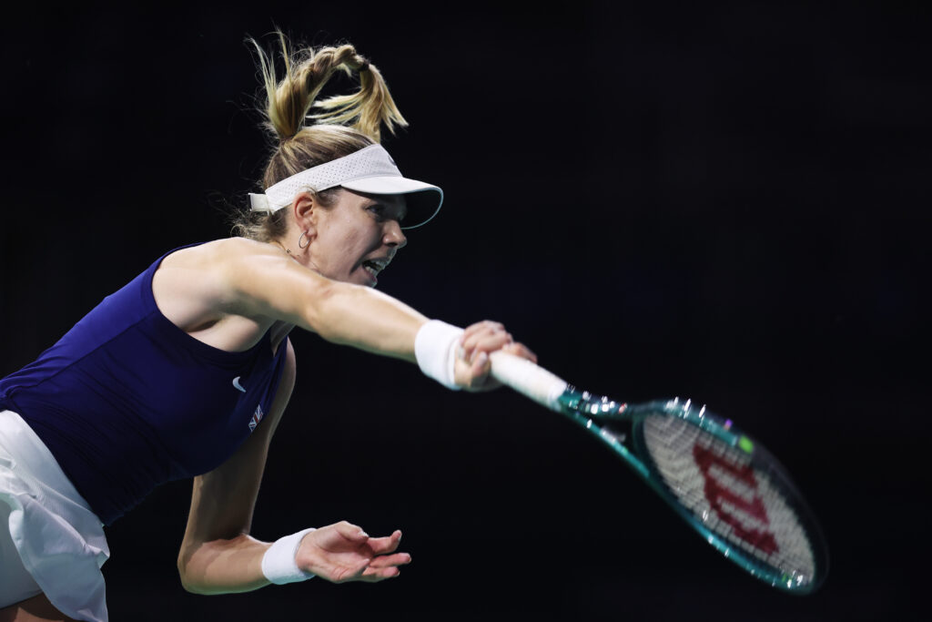 Katie Boulter of Great Britain serves in her singles match against Rebecca Sramkova of Slovakia in the semifinal tie between Great Britain and Slovakia during the Billie Jean King Cup Finals at Palacio de Deportes Jose Maria Martin Carpena on November 19, 2024 in Malaga, Spain.