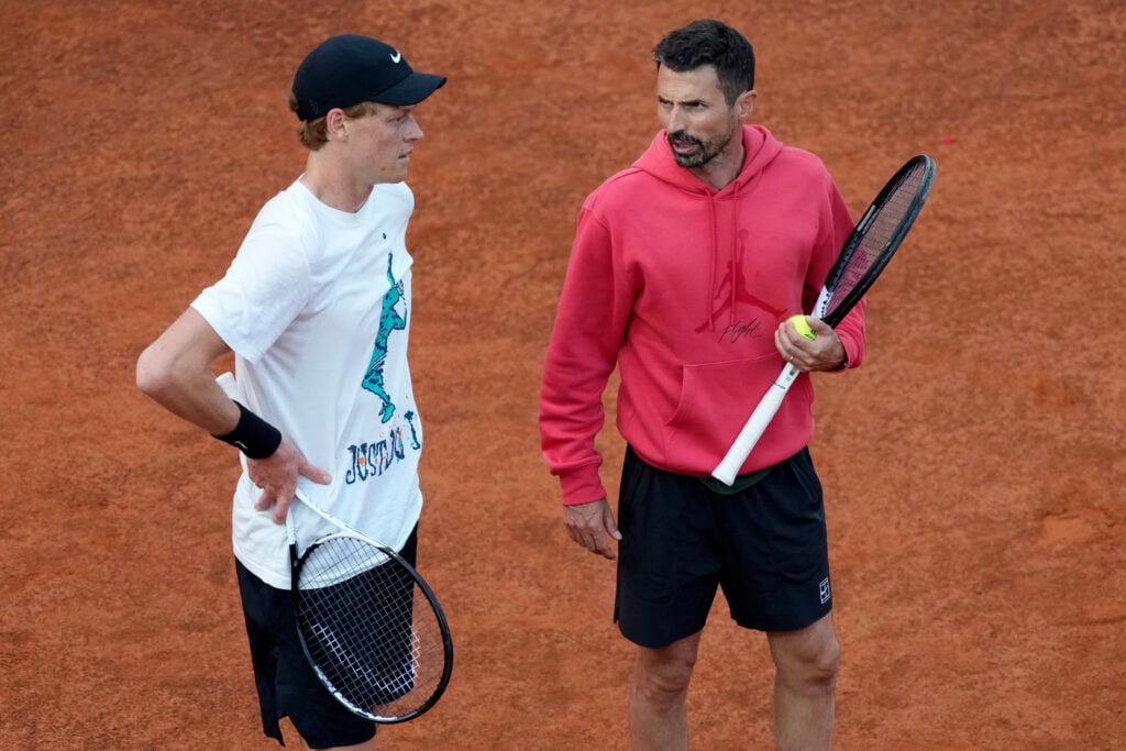 Jannik Sinner talks with his coach Simone Vagnozzi during a training session at the Internazionali BNL d'Italia 2025 tennis tournament. (Photo by Antonietta