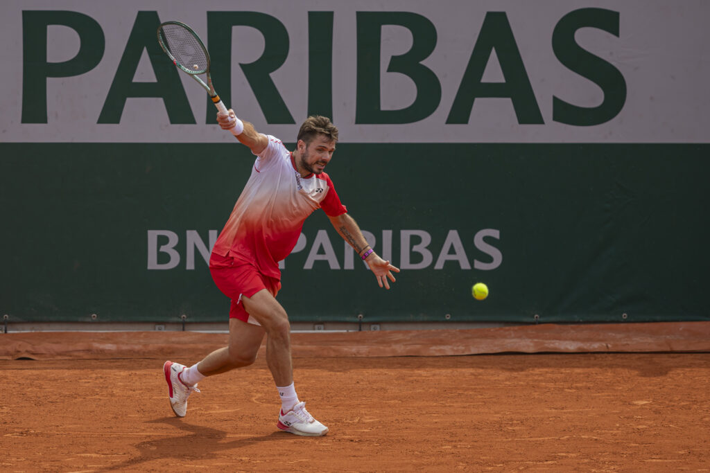 Stan Wawrinka returns the ball against Jacob Fearnley at the Roland Garros Grand Slam Tournament in Paris, France, on May 26, 2025.