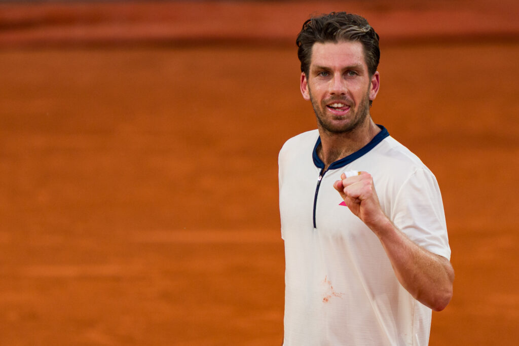 Cameron Norrie celebrating his 2025 Roland Garros victory over Jacob Fearnley