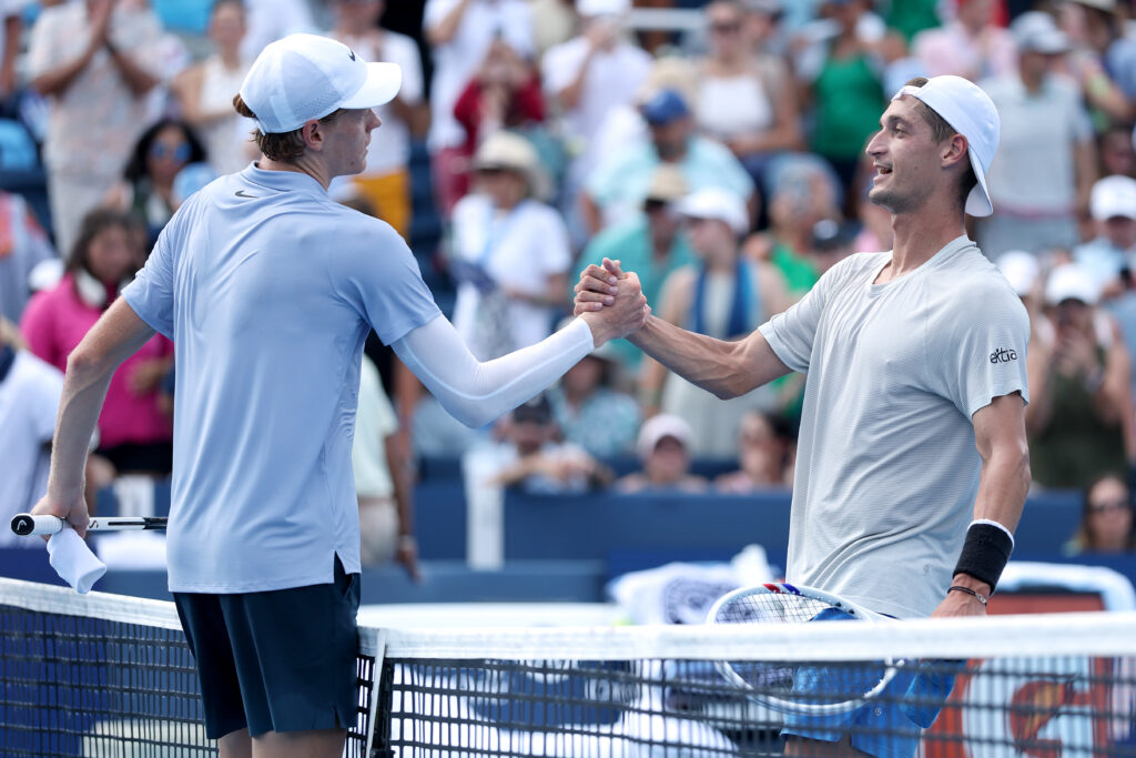Jannik Sinner of Italy is congratulated by Terence Atmane of France after their match during the semifinals of the Cincinnati Open at Lindner Family Tennis Center on August 16, 2025 in Mason, Ohio.