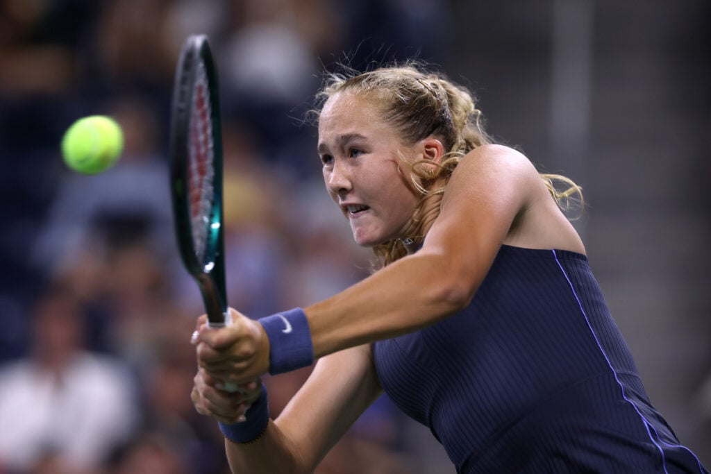 Mirra Andreeva returns a shot against Alycia Parks of the United States during their Women's Singles First Round match on Day Two of the 2025 US Open at USTA Billie Jean King National Tennis Center on August 25, 2025 in the Flushing neighborhood of the Queens borough of New York City.