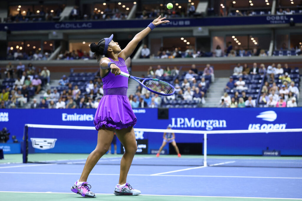 Naomi Osaka serves
