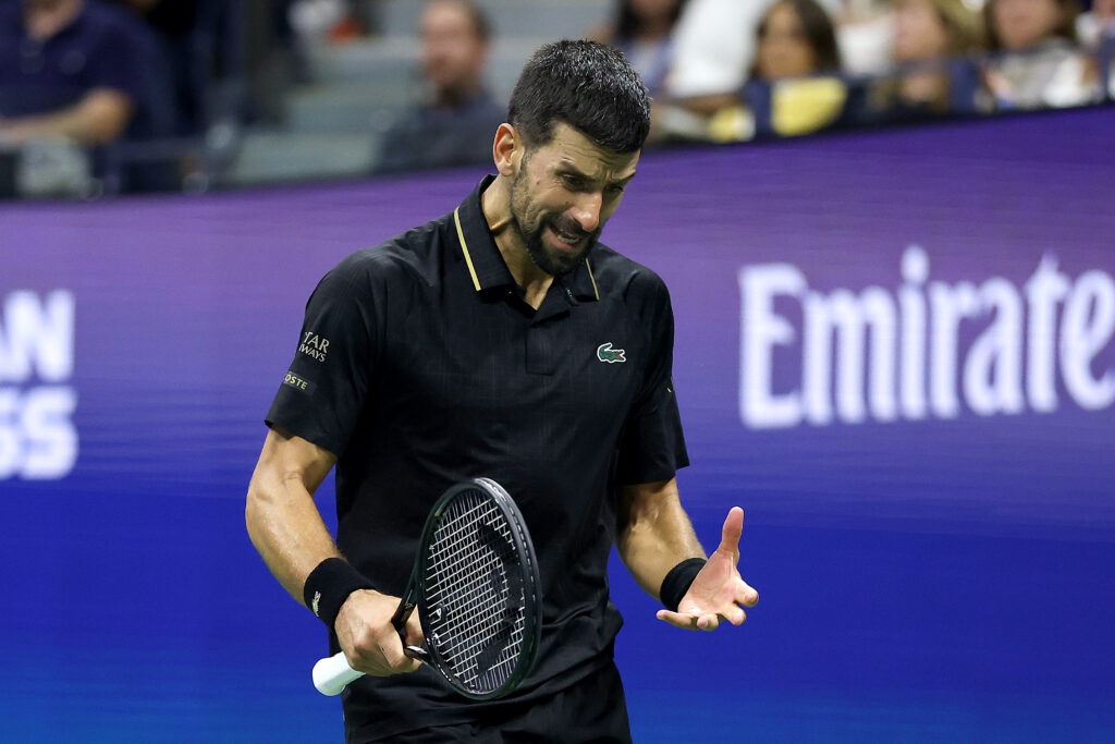 Novak Djokovic shouts and gestures