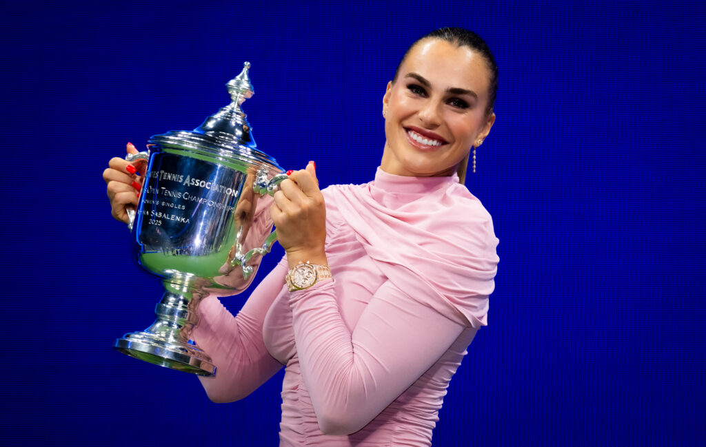 Aryna Sabalenka poses with the champions trophy after defeating Amanda Anisimova of the United States in the womens singles final on Day 14 of the US Open at USTA Billie Jean King National Tennis Center on September 06, 2025 in New York City