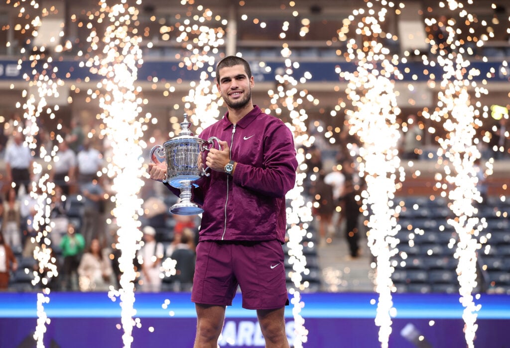 Spain's Carlos Alcaraz poses with his trophy after winning the men's singles final tennis match against Italy's Jannik Sinner on day fifteen of the US Open tennis tournament at the USTA Billie Jean King National Tennis Center in New York City on September 7, 2025.