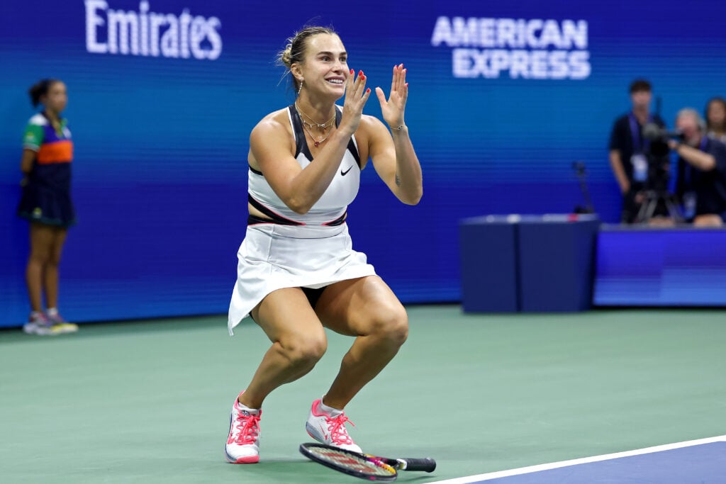 Aryna Sabalenka collapses to the ground after winning the US Open title