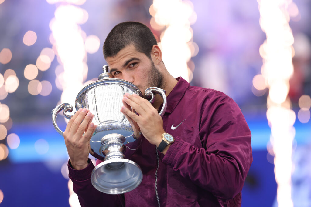 Carlos Alcaraz of Spain poses with his trophy after defeating Jannik Sinner of Italy during their Men's Singles Final match on Day Fifteen of the 2025 US Open at USTA Billie Jean King National Tennis Center on September 07, 2025 in New York City.