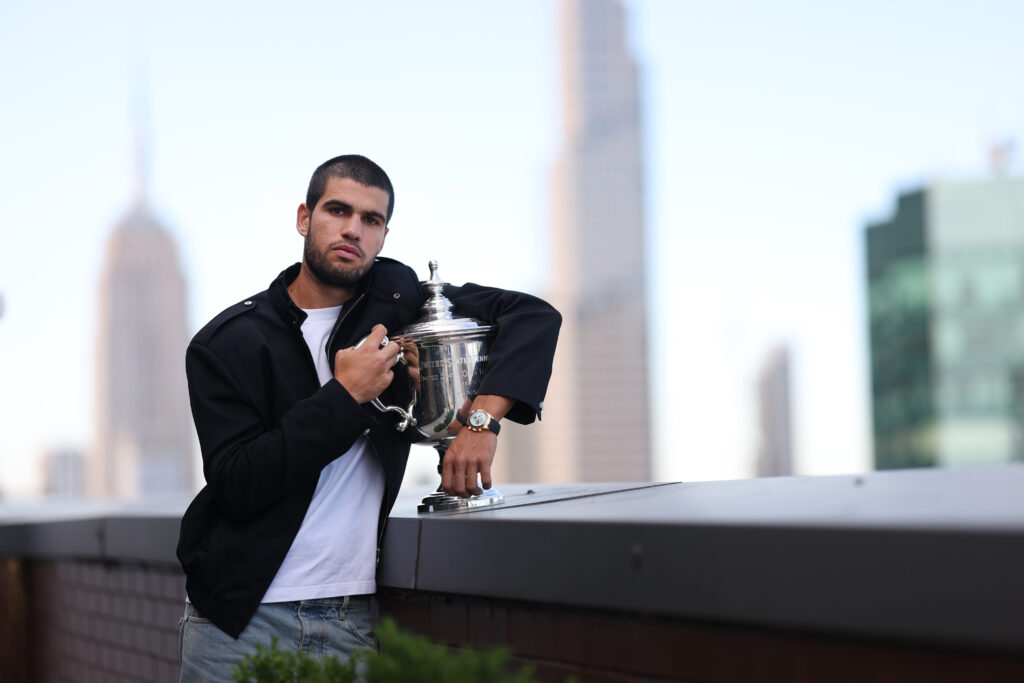 US Open 2025 Champion Carlos Alcaraz of Spain poses for a photo on the roof of the Lotte New York Palace Hotel with the Men's Singles trophy following his victory over Jannik Sinner of Italy in the Men's Singles Final on September 08, 2025 in New York City.