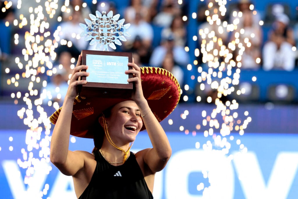 US' Iva Jovic celebrates with the trophy after winning the women's singles final match of the 2025 WTA Guadalajara Open against Colombia's Emiliana Arango in Zapopan, Mexico, on September 14, 2025.