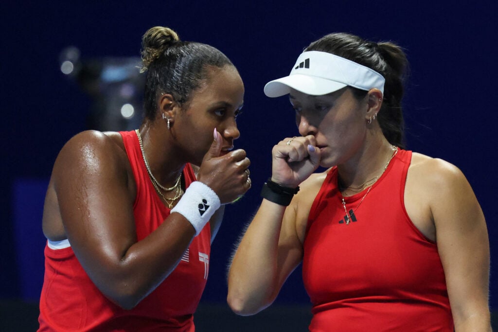 USA's Taylor Townsend (L) and Jessica Pegula prepare to play a point against Kazakhstan's Elena Rybakina and Yulia Putintseva during their women's doubles tennis match at the Billie Jean King Cup quarter-finals in Shenzhen, China's southern Guangdong province on September 18, 2025. (Photo by AFP) / China OUT