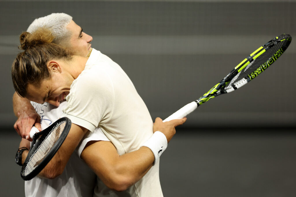 Alexander Zverev embracing Carlos Alcaraz during Laver Cup 2025 practice
