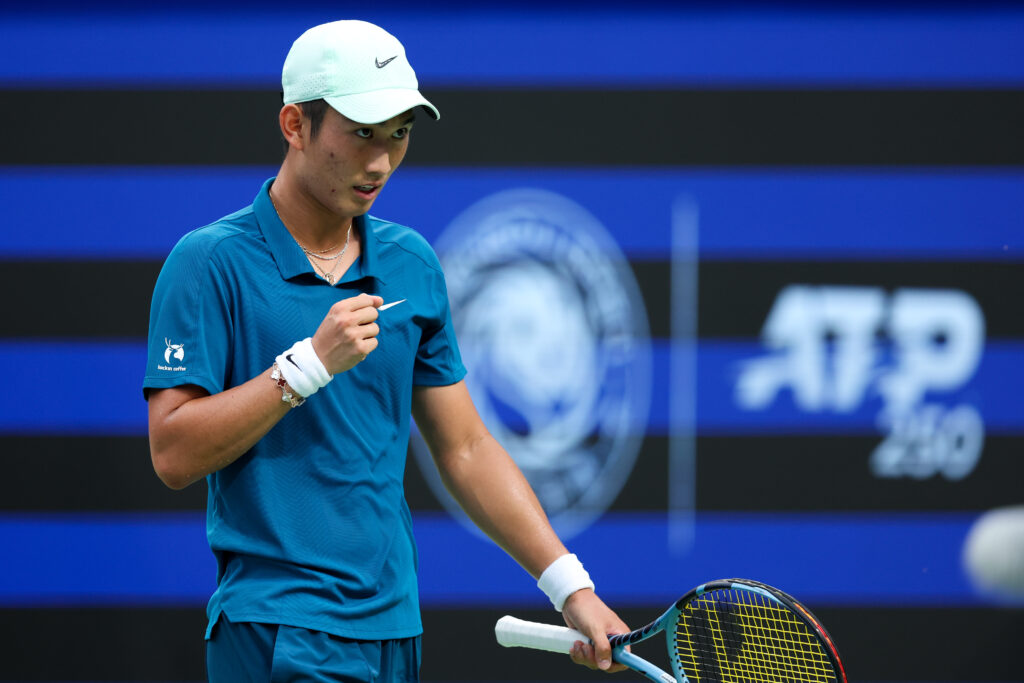 Juncheng Shang of China celebrates a point against Brandon Nakashima of USA during the men's singles second round match in the 2025 ATP Chengdu Open at Sichuan International Tennis Center on September 19, 2025 in Chengdu, China.
