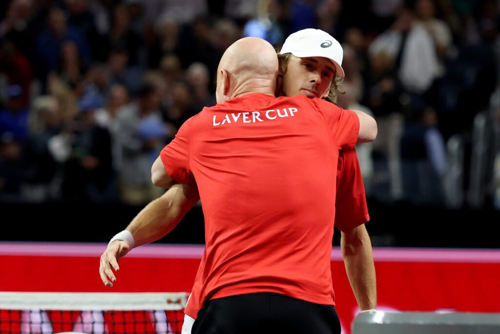 (L-R) Team World Captain Andre Agassi embraces Alex De Minaur of Team World after defeating Jakub Mensik of Team Europe during day three of Laver Cup 2025 at Chase Center on September 21, 2025 in San Francisco, California.
