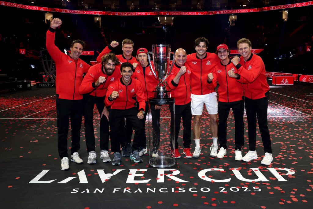 (L-R) Team World Vice Captain Patrick Rafter, Reilly Opelka of Team World, Francisco Cerundolo of Team World, Jenson Brooksby of Team World, Alex De Minaur of Team World, Team World Captain Andre Agassi, Taylor Fritz of Team World, Joao Fonseca of Team World, and Alex Michelsen of Team World poses with the Laver Cup Trophy during day three of Laver Cup 2025 at Chase Center on September 21, 2025 in San Francisco, California.