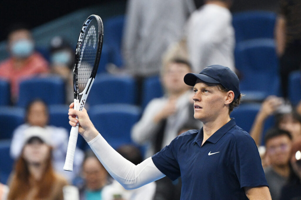 Italy's Jannik Sinner waves to the crowd after his win over France's Terence Atmane in their men's singles match at the China Open tennis tournament in Beijing on September 27, 2025.