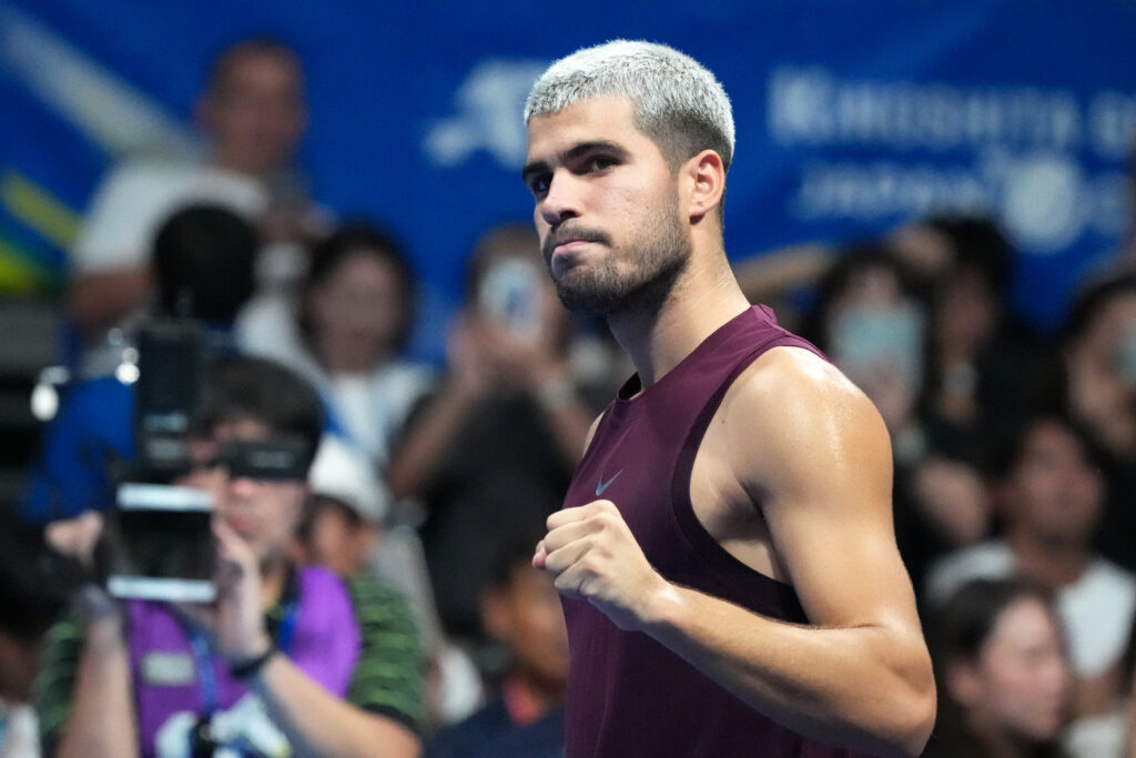 Carlos Alcaraz of Spain celebrates winning against Sebastian Baez of Argentina during the Singles Round of 32 on day two of Kinoshita Group Japan Open at Ariake Colosseum on September 25, 2025 in Tokyo, Japan.
