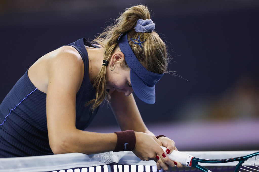 Katie Boulter of Great Britain reacts against Amanda Anisimova of the United States in the Women's Singles Second Round match on day 5 of 2025 China Open at National Tennis Center on September 26, 2025 in Beijing, China.