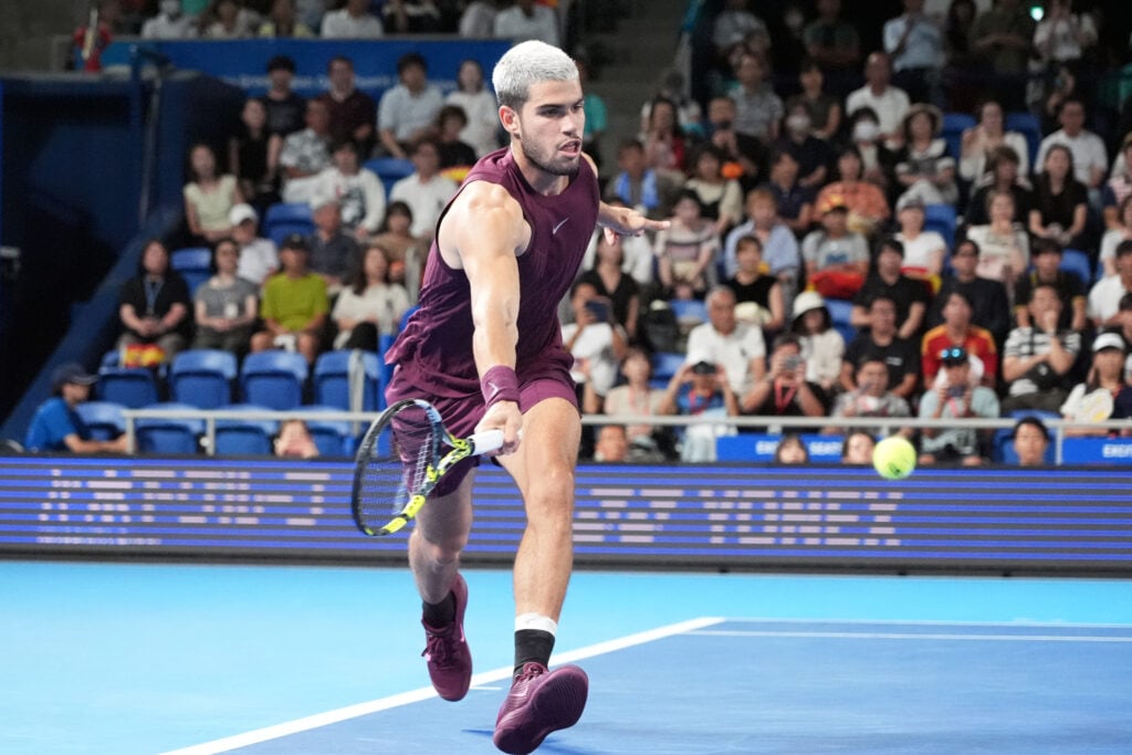 Carlos Alcaraz of Spain returns against Casper Ruud of Norway
during the Singles Semi-Final on day six of Kinoshita Group Japan Open at Ariake Colosseum on September 29, 2025 in Tokyo, Japan.