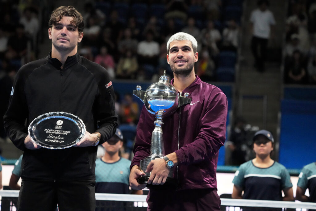 Carlos Alcaraz of Spain poses with the trophy after defeating against Taylor Fritz of United States during the Singles Final on day seven of Kinoshita Group Japan Open at Ariake Colosseum on September 30, 2025 in Tokyo, Japan.