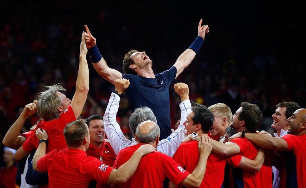 Andy Murray being lifted by his Great Britain teammates after their 2015 Davis Cup win