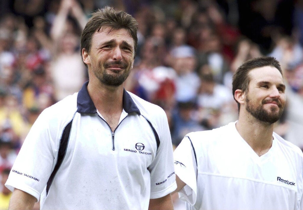 Goran Ivanisevic and Pat Rafter react after the 2001 Wimbledon Men's Singles Final.