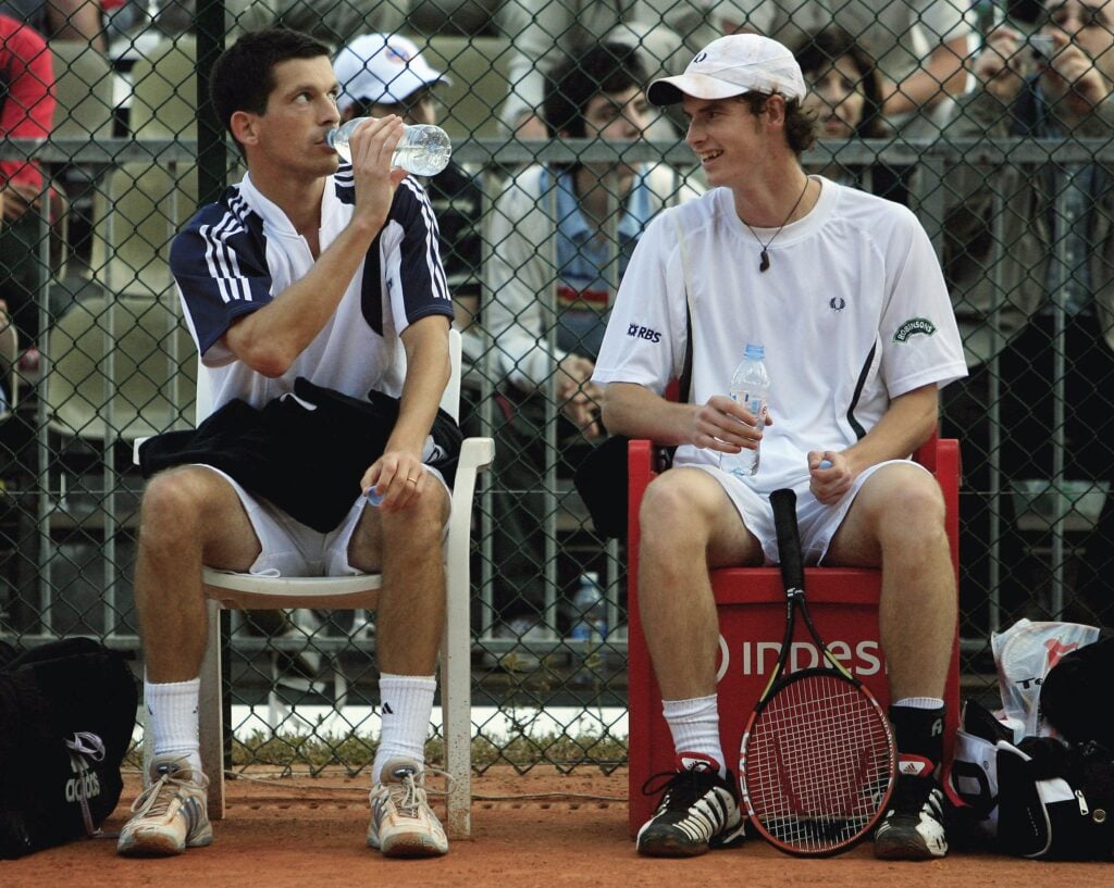 Andy Murray and Tim Henman (L) take a break during the 1st round doubles match against Tomas Berdych of Czech Republic and Jarkko Nieminen of Finland on the second day of the Rolex ATP Tennis Masters Monte Carlo at the The Monte Carlo Country Club on April 18, 2006 in Monte-Carlo, Monaco.