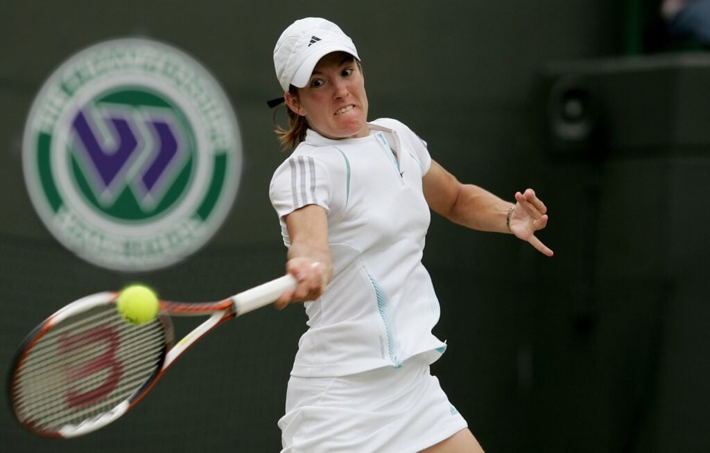 Justine Henin-Hardenne of Belgium returns a forehand to Severine Bremond of France during day eight of the Wimbledon Lawn Tennis Championships at the All England Lawn Tennis and Croquet Club on July 4, 2006 in London, England.