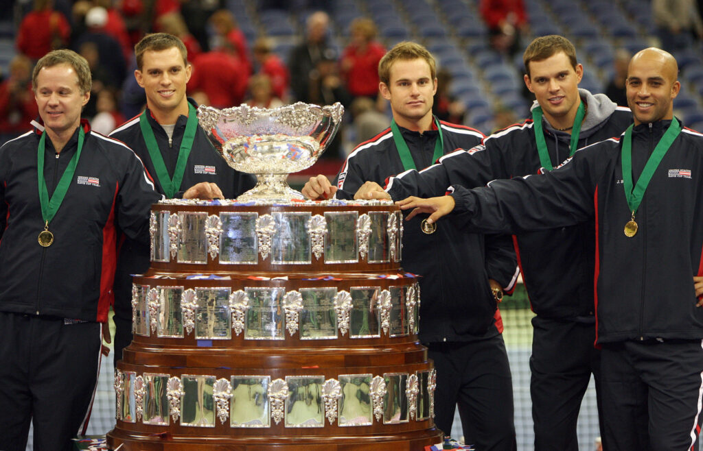 US Davis Cup team, captain Patrick McEnroe, Mike Bryan, Bob Bryan, James Blake and Andy Roddick (L-R) pose with the trophy of the 2007 Davis Cup after the US victory against Russia, 02 December 2007 at the Memorial Coliseum in Portland, Oregon. USA won the 2007 Davis Cup by 4-1.