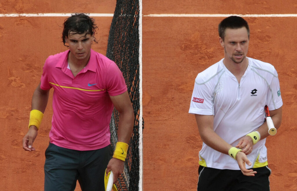 Spanish player Rafael Nadal (L) and Swedish player Robin Soderling leave the court after their French Open tennis round of 16 match on May 31, 2009 at Roland Garros Stadium in Paris. The event, the second Grand Slam tournament of 2009, runs from May 25 to June 7, 2009. Soderling won 6/2,6/7,6/4,7/6.