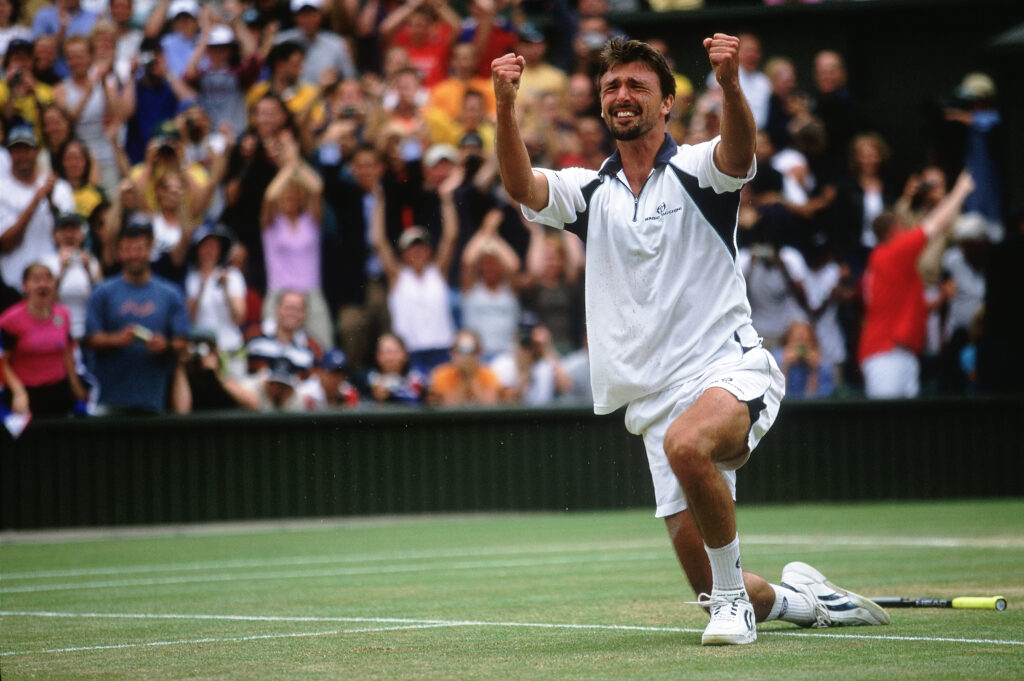 Goran Ivanisevic of Croatia celebrates winning match point during the men's final of the Wimbledon Lawn Tennis Championship held at the All England Lawn Tennis and Croquet Club, in Wimbledon, London