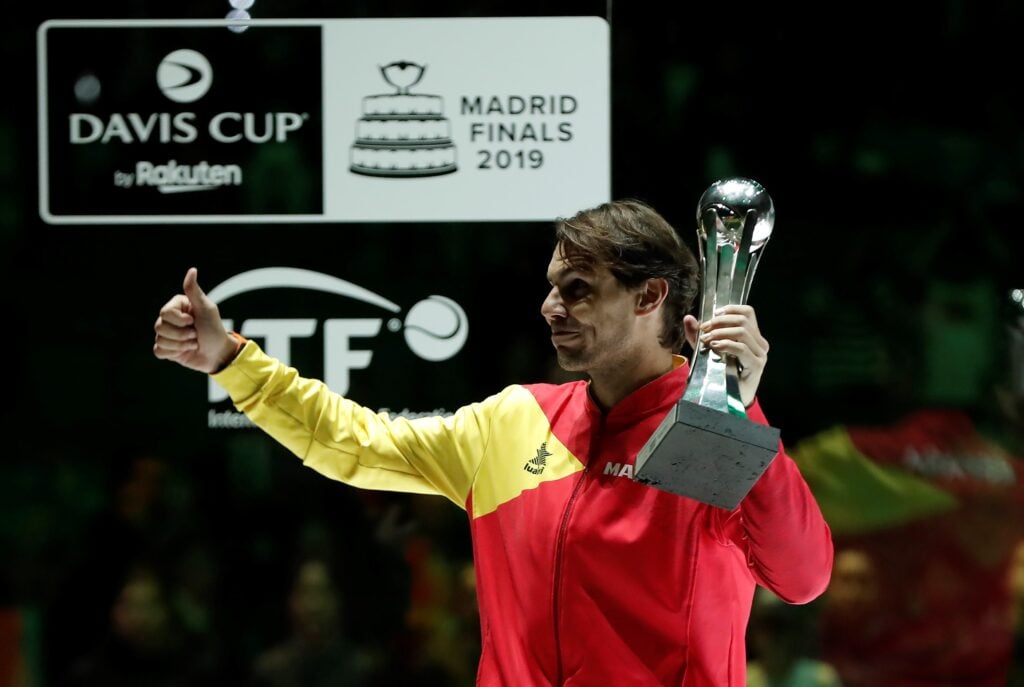 Rafael Nadal of Spain celebrates with his trophy during the ceremony after defeating Denis Shapovalov of Canada in the 2019 Davis Cup final match between Spain and Canada at La Caja Magica on November 24, 2019 in Madrid, Spain.