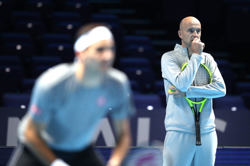 Ivan Ljubicic watches Roger Federer of Switzerland in a practice session during previews for the Nitto ATP Finals at The O2 Arena on November 08, 2019 in London, England.