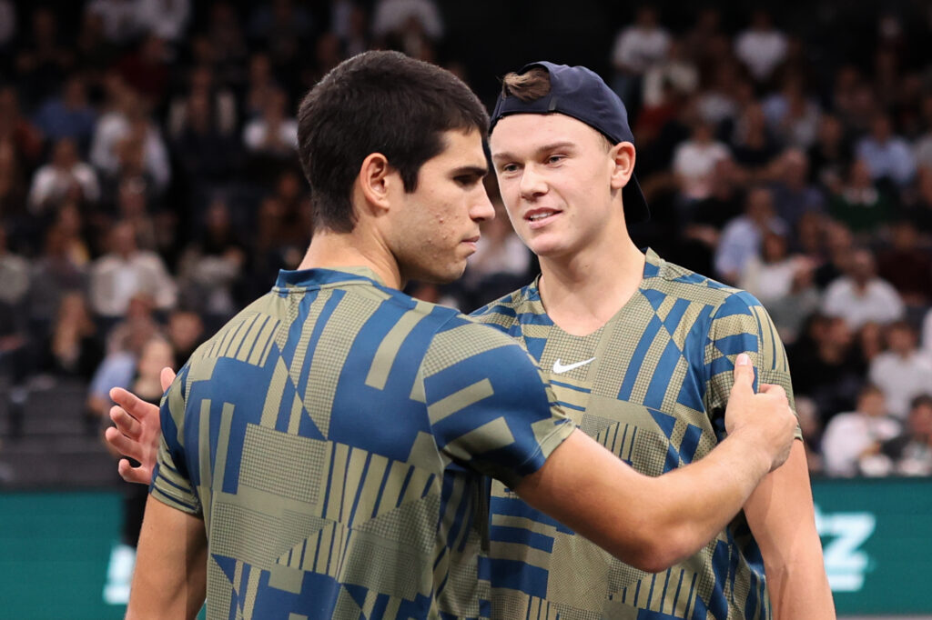 Carlos Alcaraz leaves the court after retiring injured in his match against Holger Rune in the Quarter finals during day five of the Rolex Paris Masters tennis tournament at Palais Omnisports de Bercy