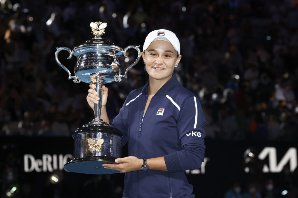 Ashleigh Barty of Australia kisses the Daphne Akhurst Memorial Cup after winning her Women’s Singles Final match against Danielle Collins of United States during day 13 of the 2022 Australian Open at Melbourne Park on January 29, 2022 in Melbourne, Australia.