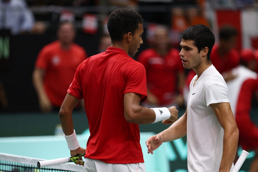 Felix Auger-Aliassime of Canada saludates to Carlos Alcaraz of Spain after winning during the Davis Cup by Rakuten 2022, Finals Group B, tennis match 2 played between Spain and Canada at Fuente de San Luis pavilion on September 16, 2022, in Valencia, Spain.
