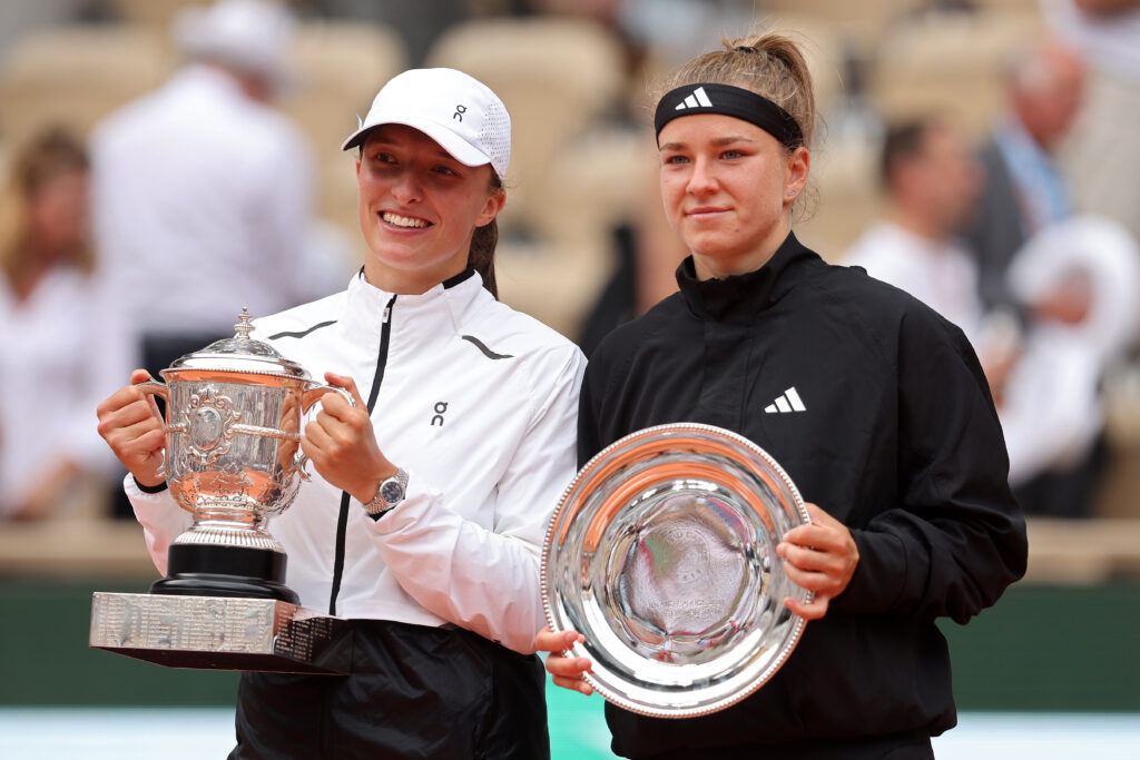 Iga Swiatek of Poland and Karolina Muchova of Czech Republic pose with their winners and runners-up trophies after the Women's Singles Final match on Day Fourteen of the 2023 French Open at Roland Garros on June 10, 2023 in Paris, France.