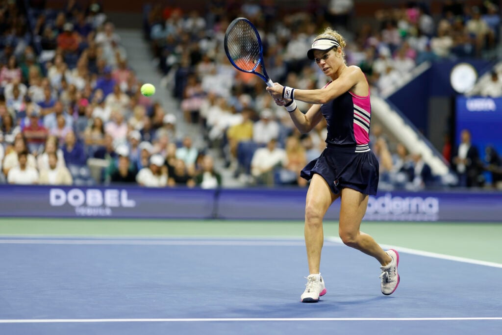 Laura Siegemund of Germany returns a shot against Coco Gauff of the United States during their Women's Singles First Round match on Day One of the 2023 US Open at the USTA Billie Jean King National Tennis Center on August 28, 2023 in the Flushing neighborhood of the Queens borough of New York City.