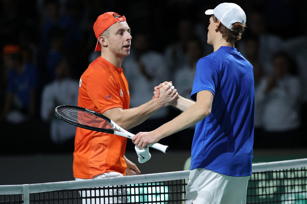 Italy's Jannik Sinner (R) shakes hands with Netherlands' Tallon Griekspoor after winning the second men's single quarter-final tennis match between Italy and Netherlands of the Davis Cup tennis tournament at the Martin Carpena sportshall, in Malaga on November 23, 2023.