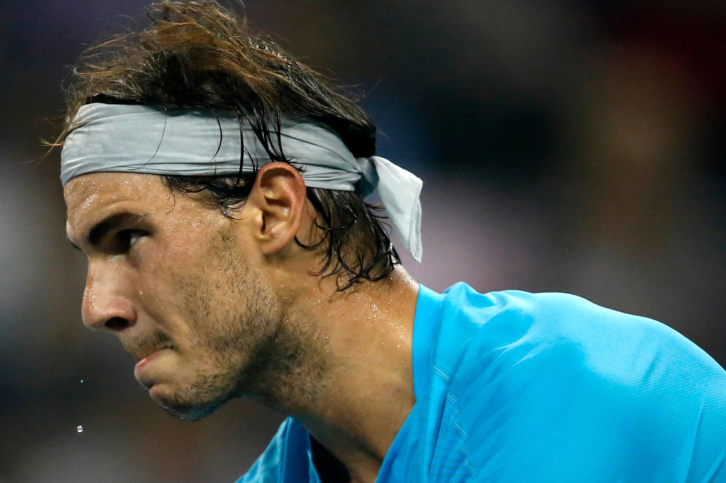 Rafael Nadal of Spain reacts against Carlos Berlocq of Argentina on day four of the Shanghai Rolex Masters at the Qi Zhong Tennis Center on October 10, 2013 in Shanghai, China.