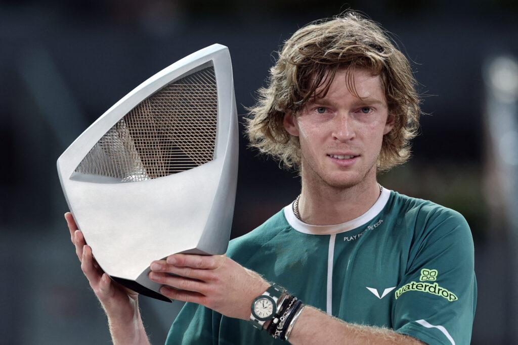 Russia's Andrey Rublev holds his trophy after winning the 2024 ATP Tour Madrid Open tournament singles final tennis match at Caja Magica in Madrid on May 5, 2024.