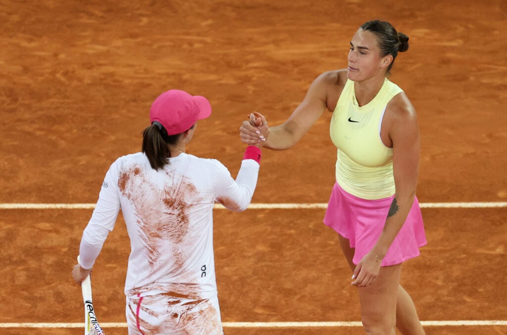Iga Swiatek of Poland and Aryna Sabalenka shake hands at the net after the semi-final on Day 8 of the Cincinnati Open at Lindner Family Tennis Center on August 18, 2024 in Mason, Ohio