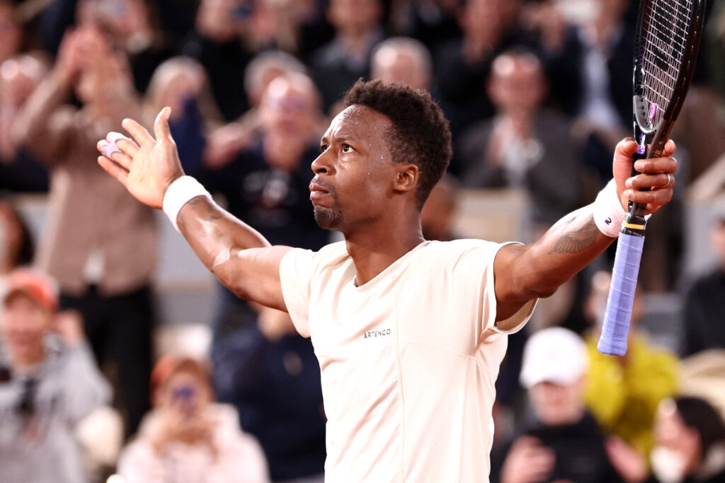 France's Gael Monfils celebrates after winning his men's singles match against Brazil's Thiago Seyboth Wild on Court Philippe-Chatrier on day two of the French Open tennis tournament at the Roland Garros Complex in Paris on May 27, 2024.