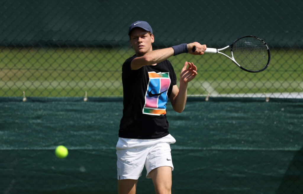 Jannik Sinner of Italy plays a forehand during practice prior to The Championships Wimbledon 2024 at All England Lawn Tennis and Croquet Club on June 26, 2024 in London, England.